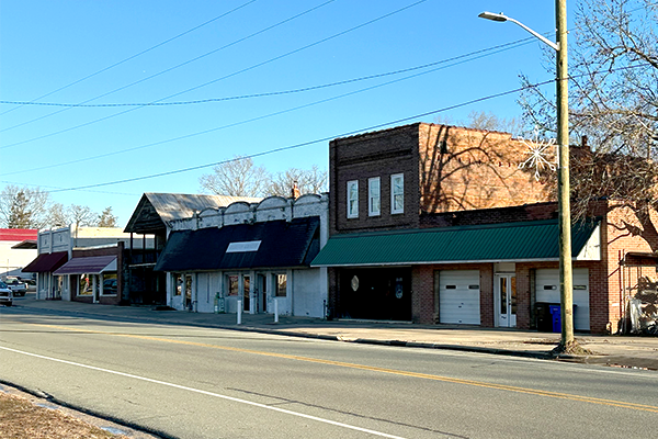 Downtown street with buildings on the right side